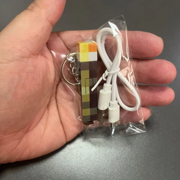 Glow-in-the-Dark Anime Gamer Keychain - Classic Torch Design with Pixelated Wooden Texture, Fashionable Plastic Pendant - Image 7