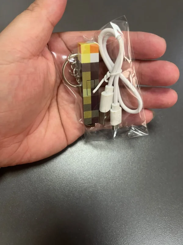Glow-in-the-Dark Anime Gamer Keychain - Classic Torch Design with Pixelated Wooden Texture, Fashionable Plastic Pendant - Image 10