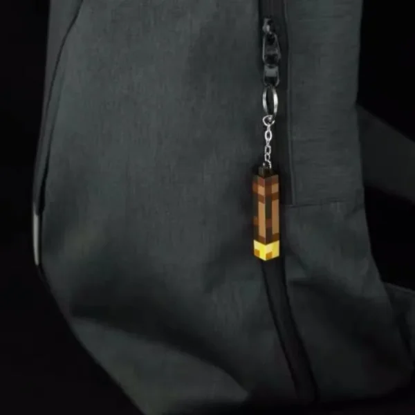 Glow-in-the-Dark Anime Gamer Keychain - Classic Torch Design with Pixelated Wooden Texture, Fashionable Plastic Pendant - Image 3